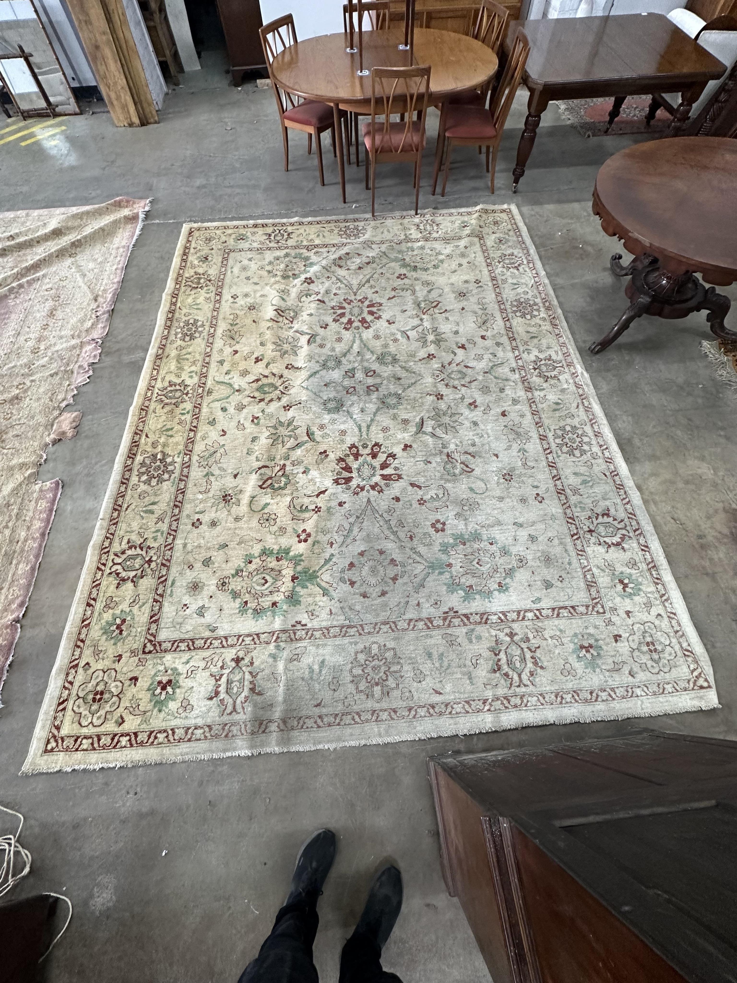 An Indian carpet, approximately 380 x 280cm. Condition - good